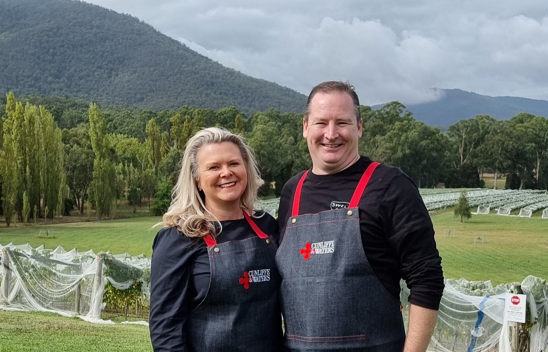 Josh and Simone, owners of Cunliffe & Waters, standing together in the Yarra Valley